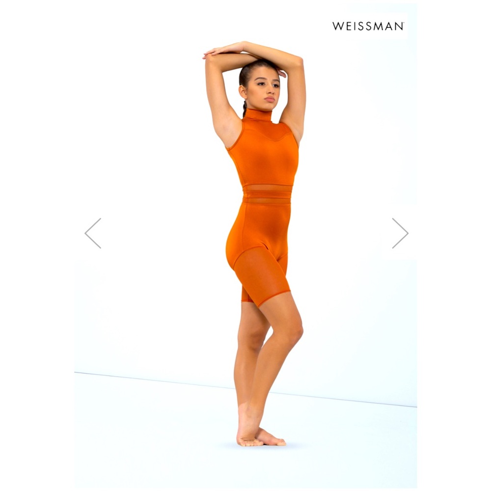 Stylish orange bodysuit by Weissman. Features mesh details. Perfect for dance.